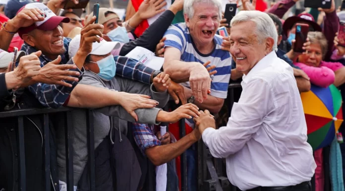 Mexico’s President leads massive pro-government march through capital