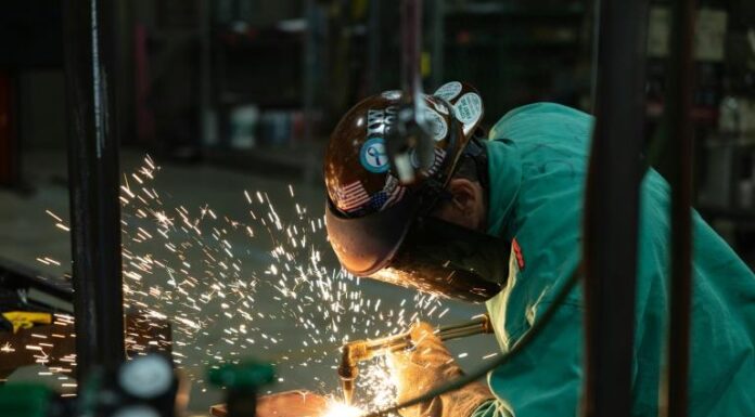 US sees strong job gains in October as wages move higher