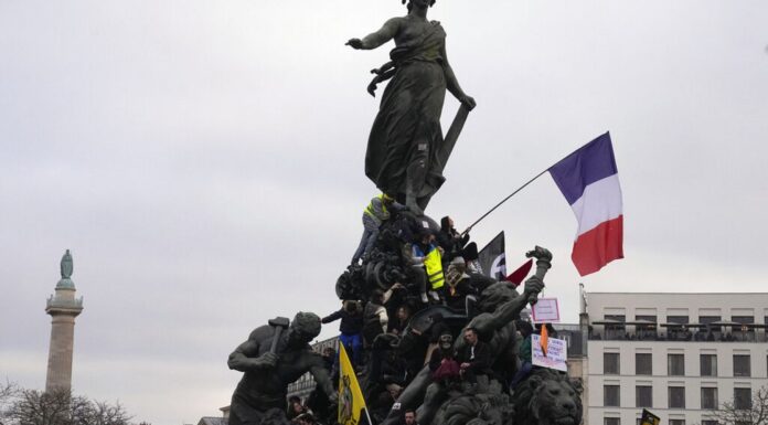 Almost a million march in France in protest at government pension reform plans