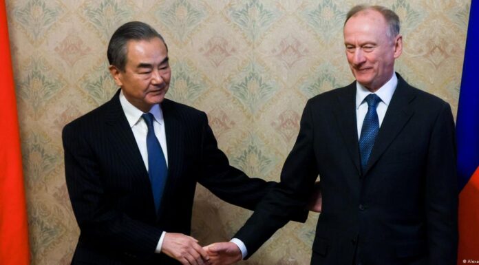 China’s top diplomat says relations with Russia ‘rock solid’
