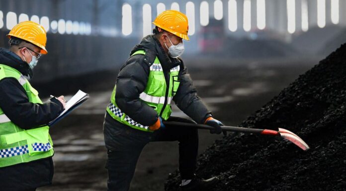 China: Rescue efforts for 53 miners paused after mudslide