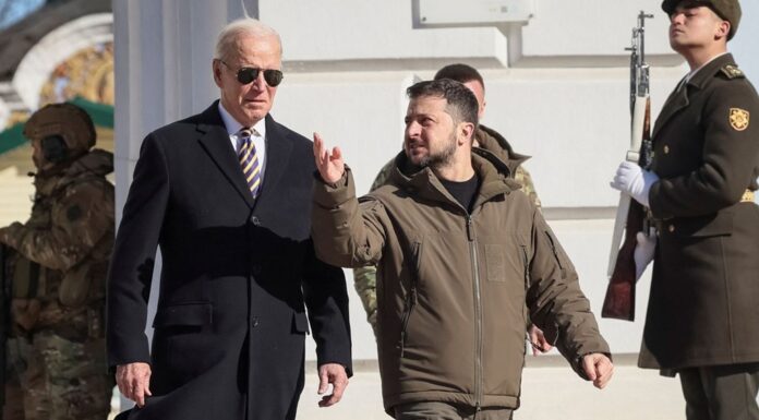 Ukraine war – latest: Joe Biden warns freedom at stake; Wagner Group founder hits out at Russian officials; Putin says he’s ‘proud’ of troops at rally
