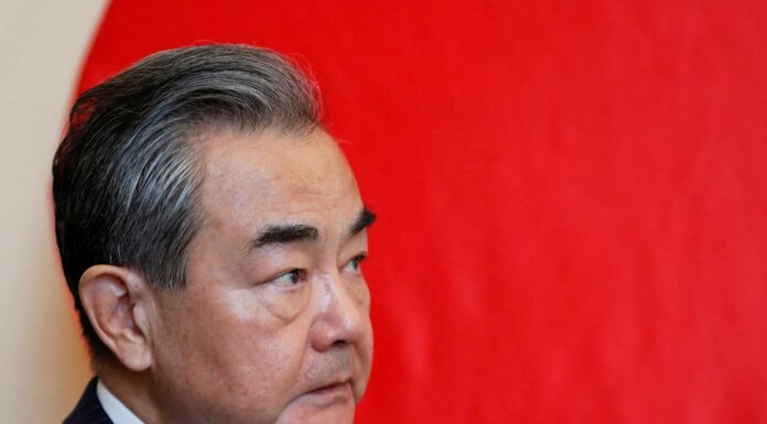 Ukraine war – latest: China’s top diplomat visits Russia; Putin plans massive rally in Moscow