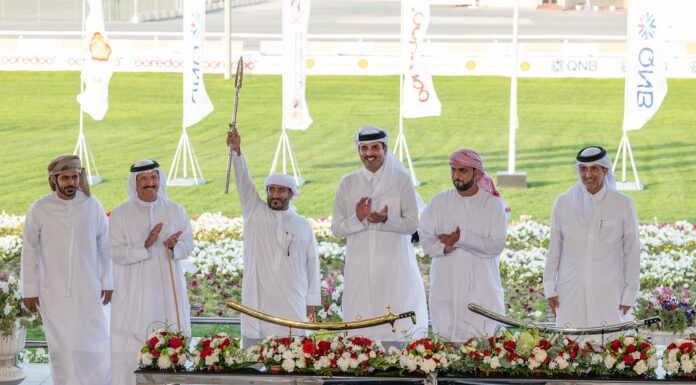 His Highness crowns the winners at the end of the Purebred Arabian Camel Festival on His Highness’s sword