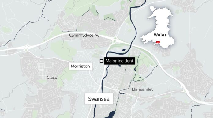One dead and three in hospital after suspected gas explosion in Swansea