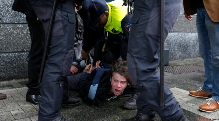 Netherlands visit by France’s Macron disrupted by protesters