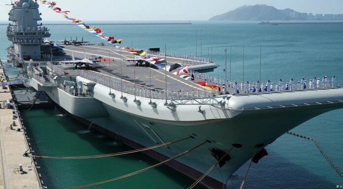 Taiwan says Chinese aircraft carrier sailed through strait