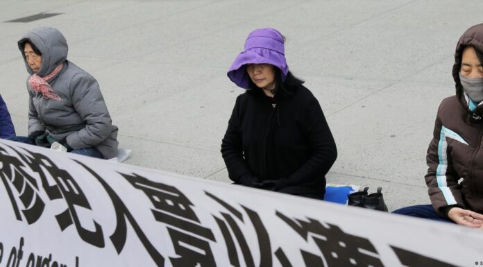 US charges 2 over Chinese plot against Falun Gong movement