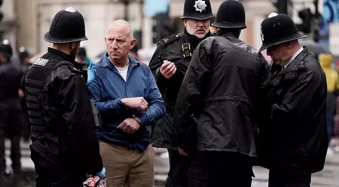 Scores arrested over coronation weekend, in ‘heavy-handed’ police operation