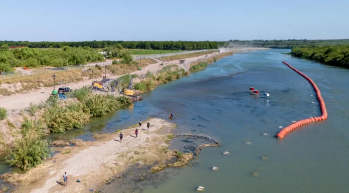 Biden administration sues Texas over anti-migrant river buoys