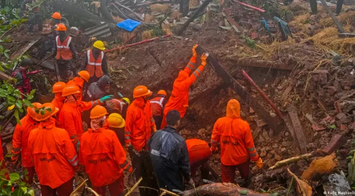 India landslide: Rescuers push on as death toll rises