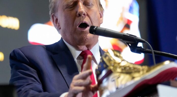Trump hawks $399 golden sneakers after court-ordered fine
